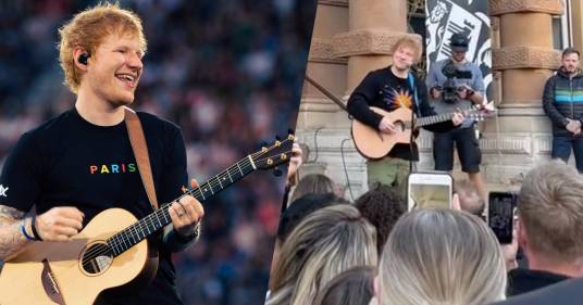Ed Sheeran canta a sorpresa in piazza e regala la chitarra a un piccolo fan: i video