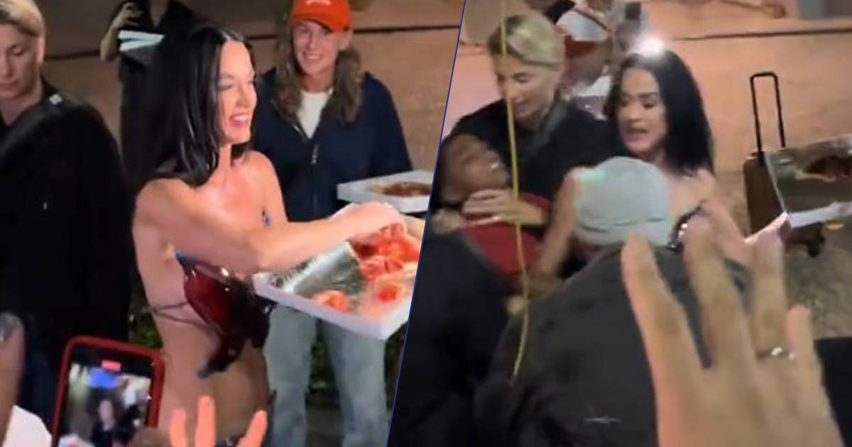 Un fan prova ad abbracciare Katy Perry lei gli offre una fetta di pizza il video  virale