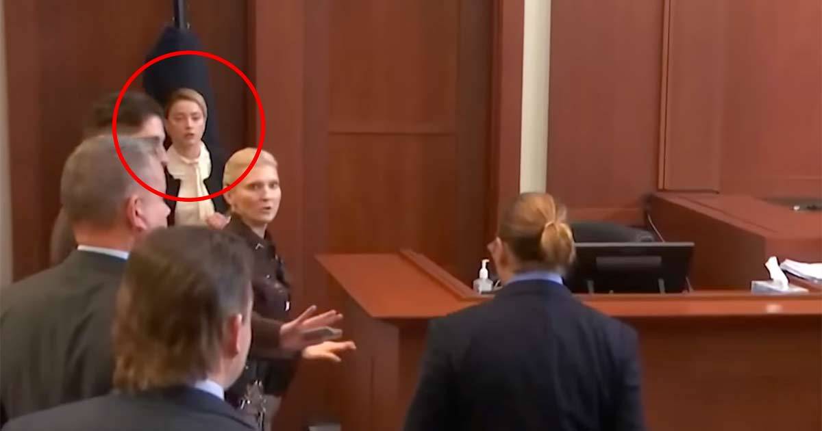 Amber Heard indietreggia spaventata quando vede Johnny Depp in tribunale